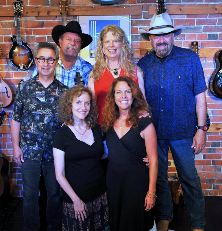 back: Ernie Martinez, Johnny Neill, Leann Roberts, John Chandler; front: Sally Barris, Rebecca Folsom