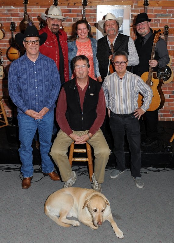 left to right. back: Jon Chandler, Mary Beth Cross, Johnny Neill, Mike Engberg;  front: Jeff Graves, Kit Simon, Ernie Martinez;  floor:  Toby the wonder dog