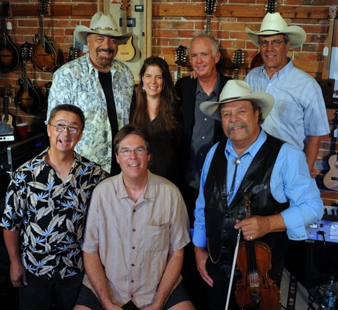 back: Jon Chandler, Willie Hammond,
                            Mike Fleming, Jeff Graves. front: Ernie
                            Martinez, Kit Simon, Johnny Neill