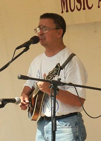 playing mandolin: Ernie Martinez: Bands,
                          Singers, Songwriters / Composers, Solo
                          Performers, Sidemen, Instrumentalists,
                          Performers, Entertainers, Musicians