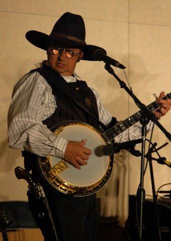 cowboy playing banjo: Ernie Martinez:
                          Bands, Singers, Songwriters / Composers, Solo
                          Performers, Sidemen, Instrumentalists,
                          Performers, Entertainers, Musicians