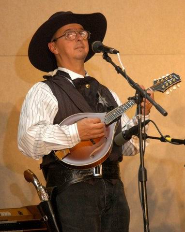 cowboy playing mando: Ernie Martinez:
                          Bands, Singers, Songwriters / Composers, Solo
                          Performers, Sidemen, Instrumentalists,
                          Performers, Entertainers, Musicians